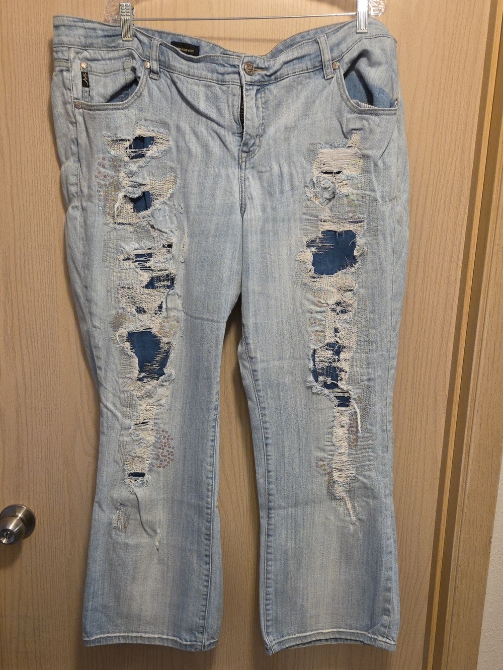 torrid Light Blue Distressed Boot Cut Jeans with Dark Patch Accents